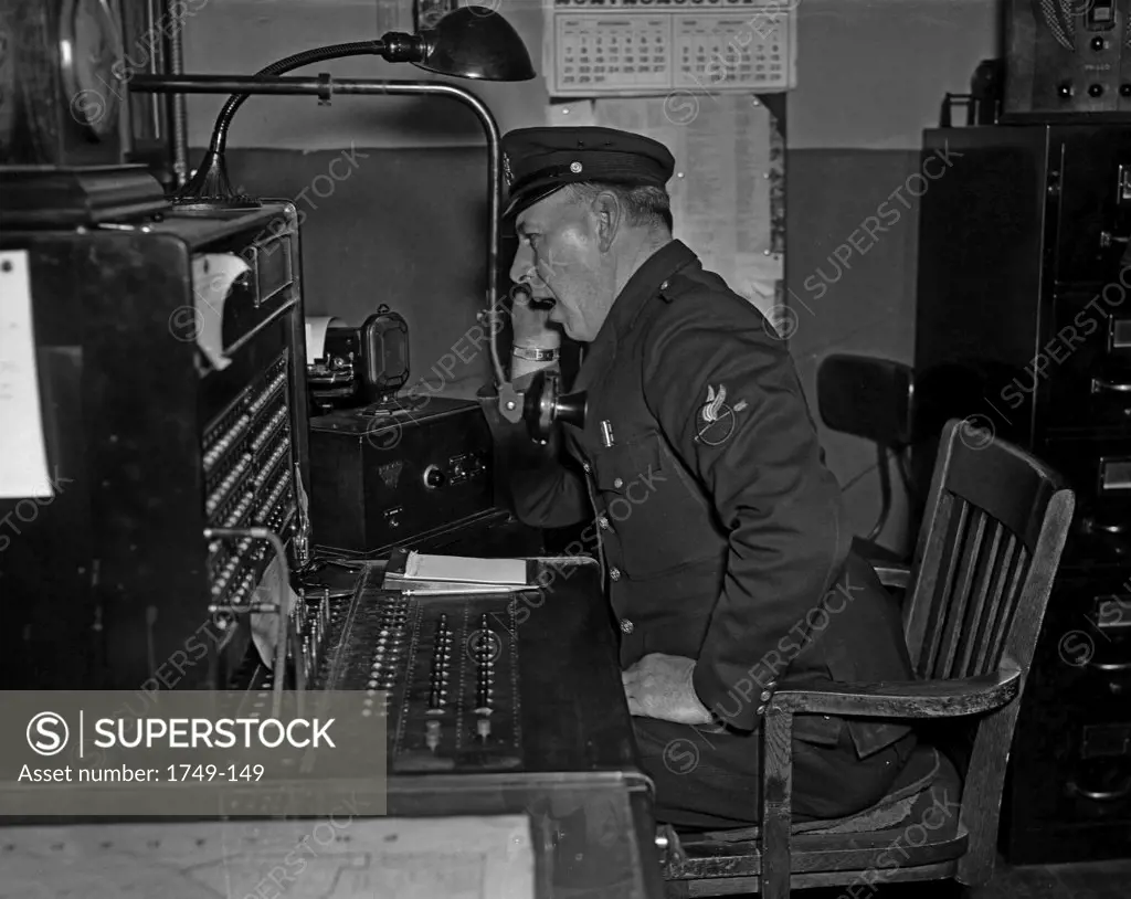 Police officer using dispatch radio