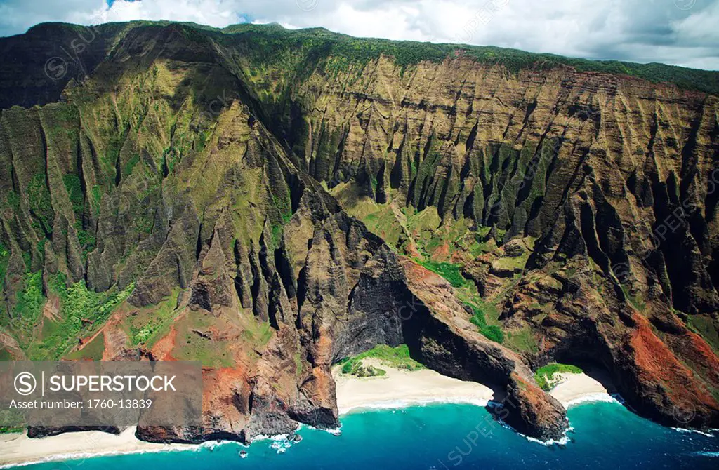 Hawaii, Kauai, Na Pali Coast, Aerial view of Honopu Valley sea arch and beach.