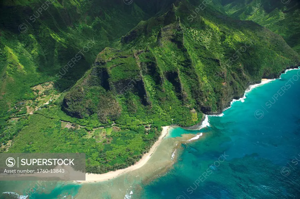 Hawaii, Kauai, Na Pali Coast, Aerial view of National Tropical Botanical Gardens Limahuli Gardens and Ke´e Beach.