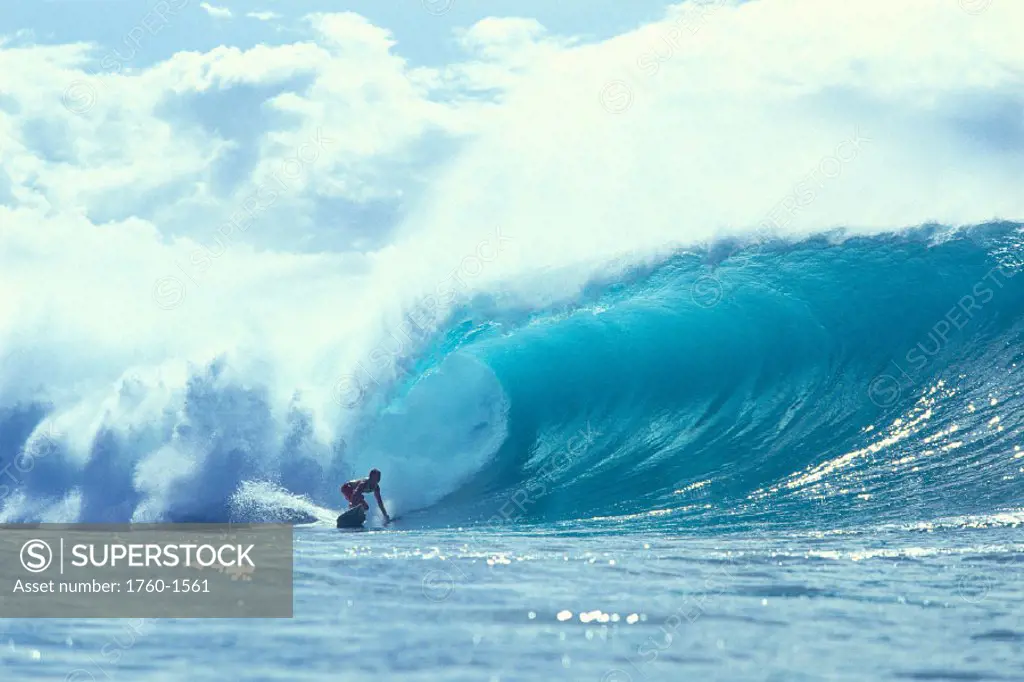 Hawaii, Shawn Briley catches giant curling wave, shimmery water C1409