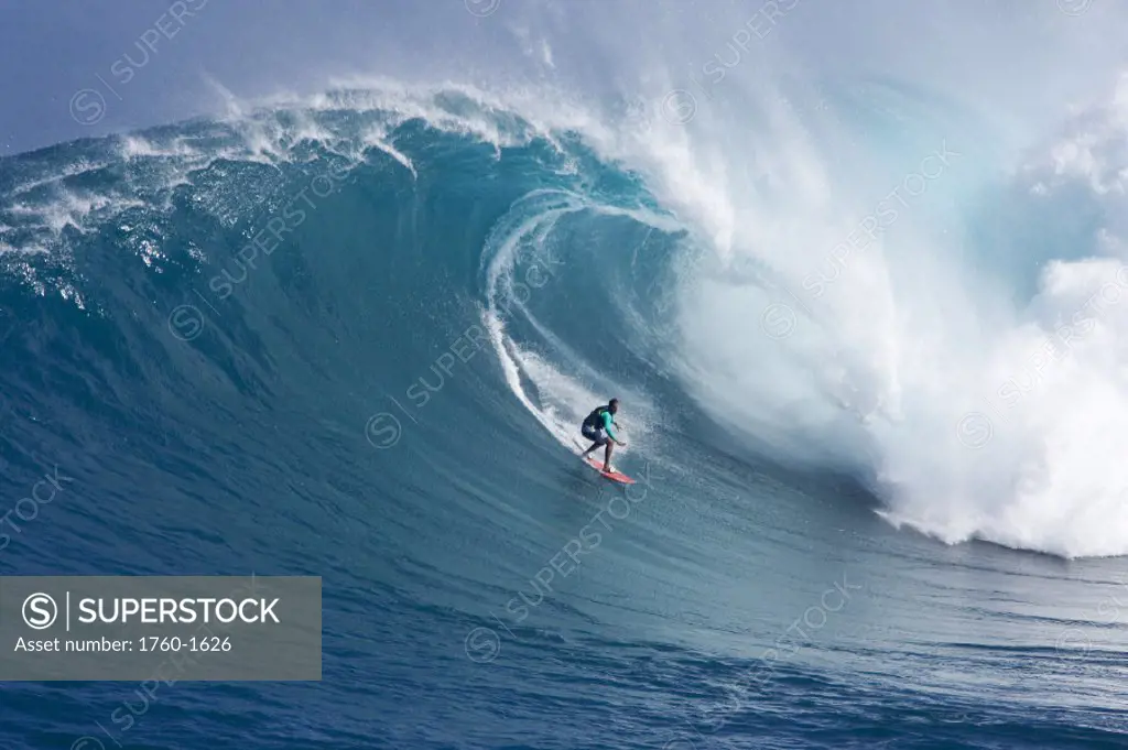 Hawaii, Maui, Yuri Farrant surfs huge wave at Jaws, aka Peahi.