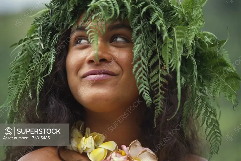 French Polynesia, Tahiti, Bora Bora, Portrait of local woman with fern lei.