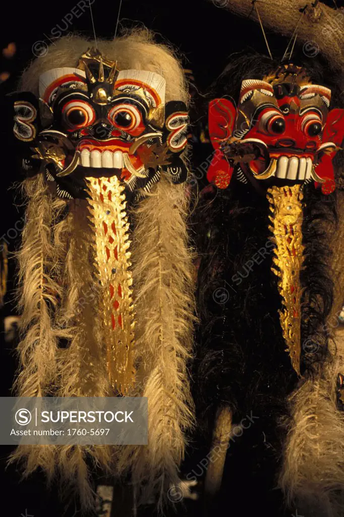 Indonesia, Bali, closeup of Barong dance masks hanging