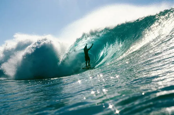 Hawaii, Oahu, North Shore, Pipeline, Shadow of surfer in pipeline wave