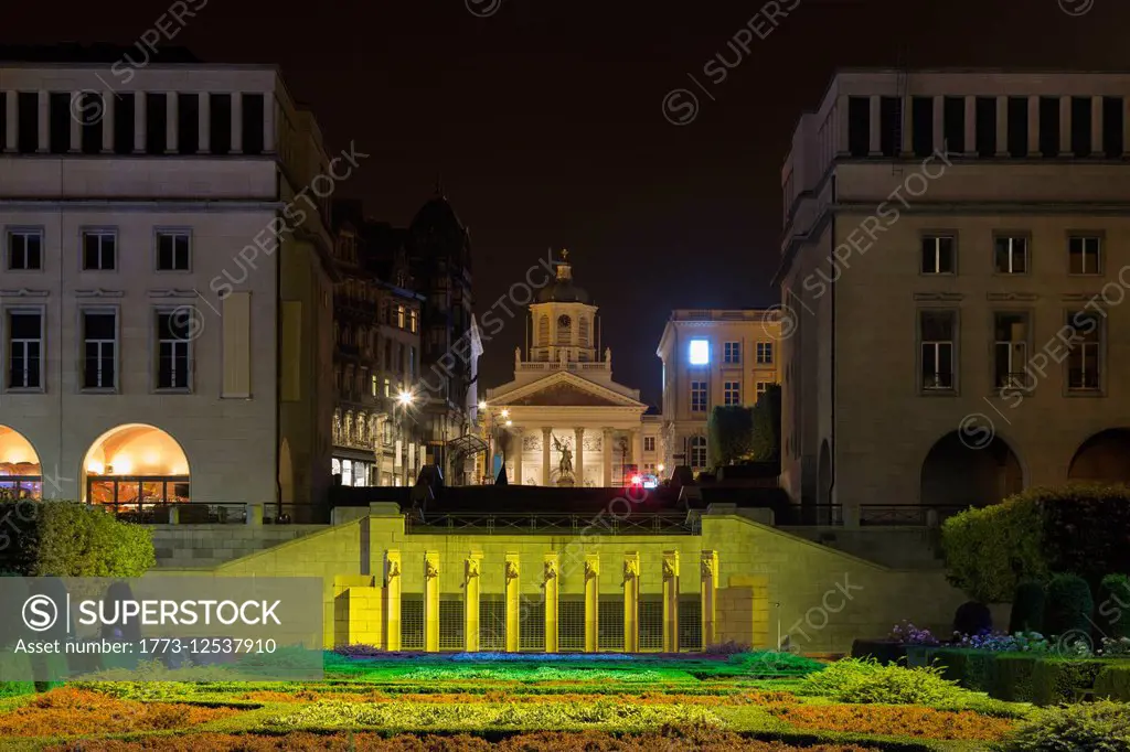 View of Mont des Arts garden to Saint Jacques-sur-Coudenberg on Place Royale at night, Brussels, Belgium