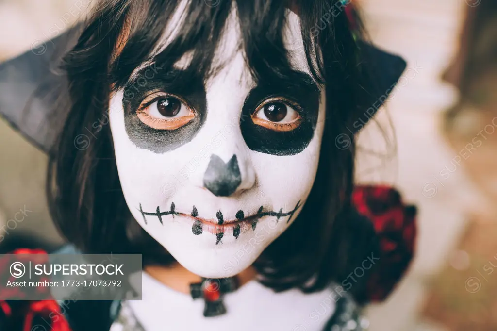 Girl with Halloween face paint