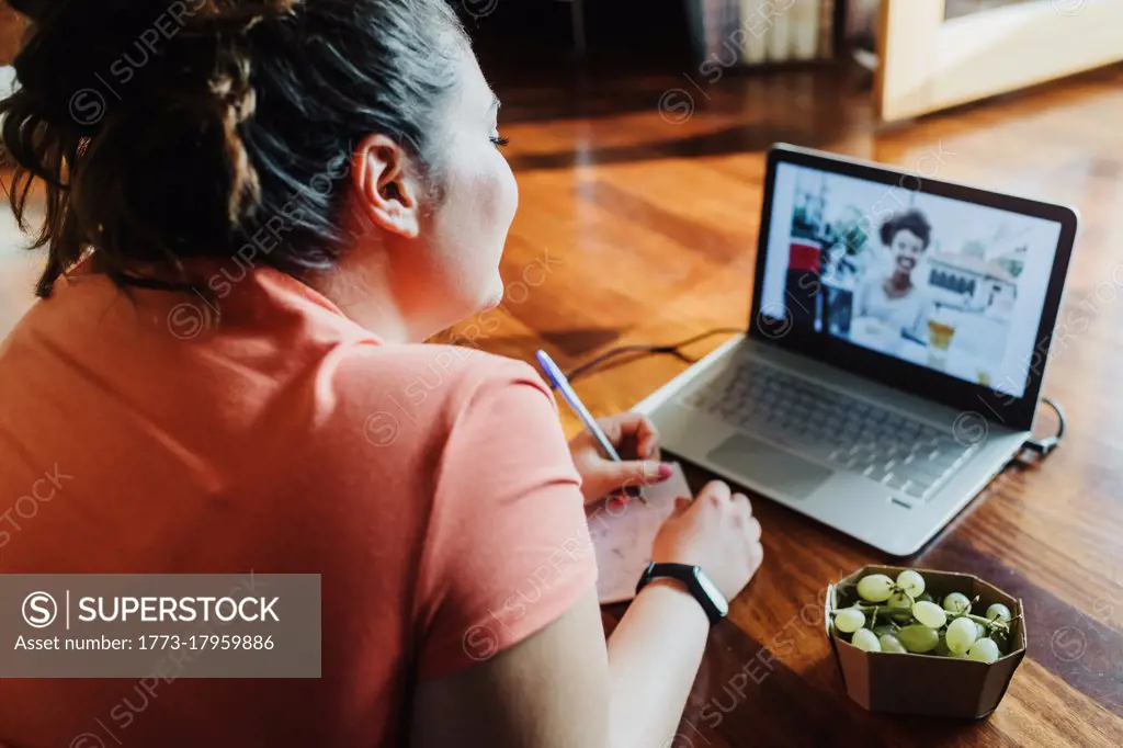 Young woman taking remote learning course