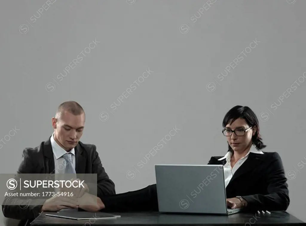 Man giving woman foot massage