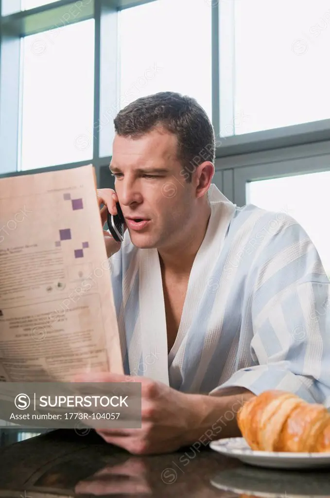 Portrait of a male reading the paper