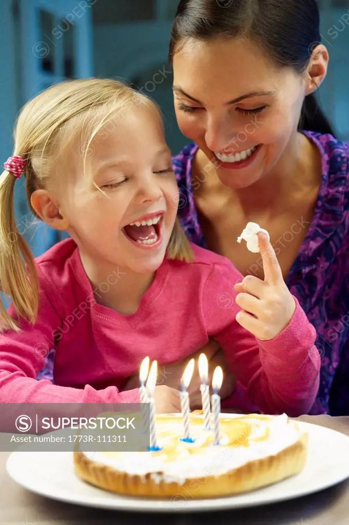 Mother and daughter celebrating birthday