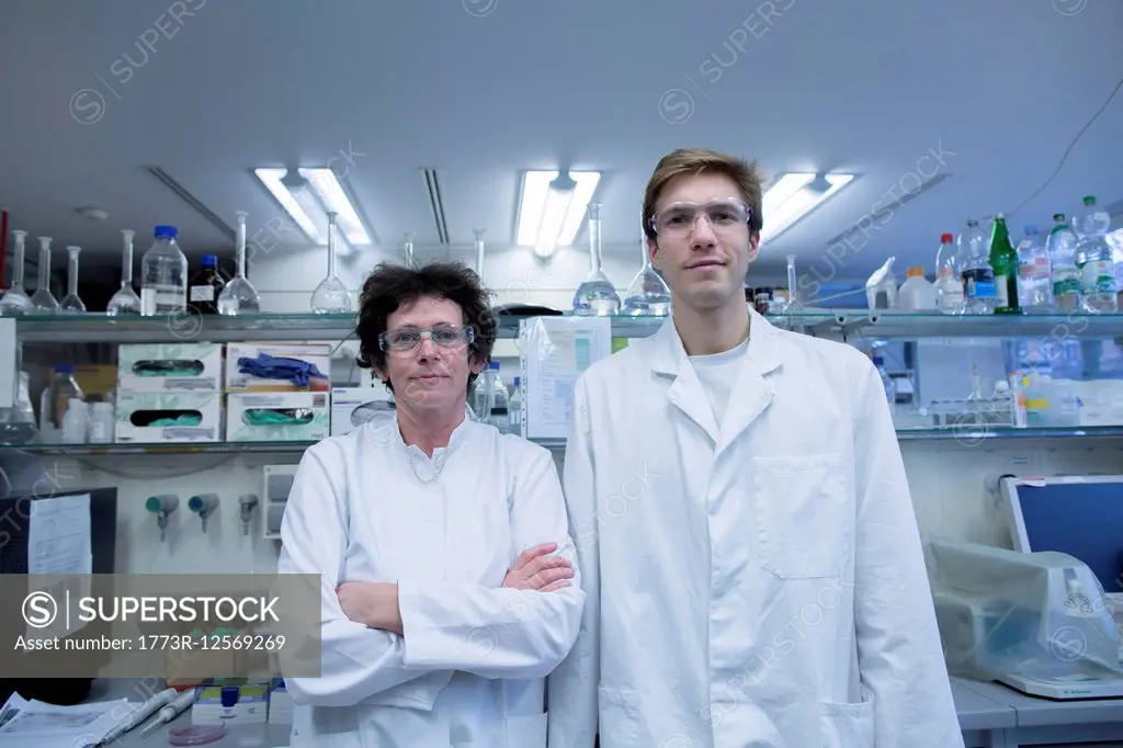 Portrait of male and female scientist in lab