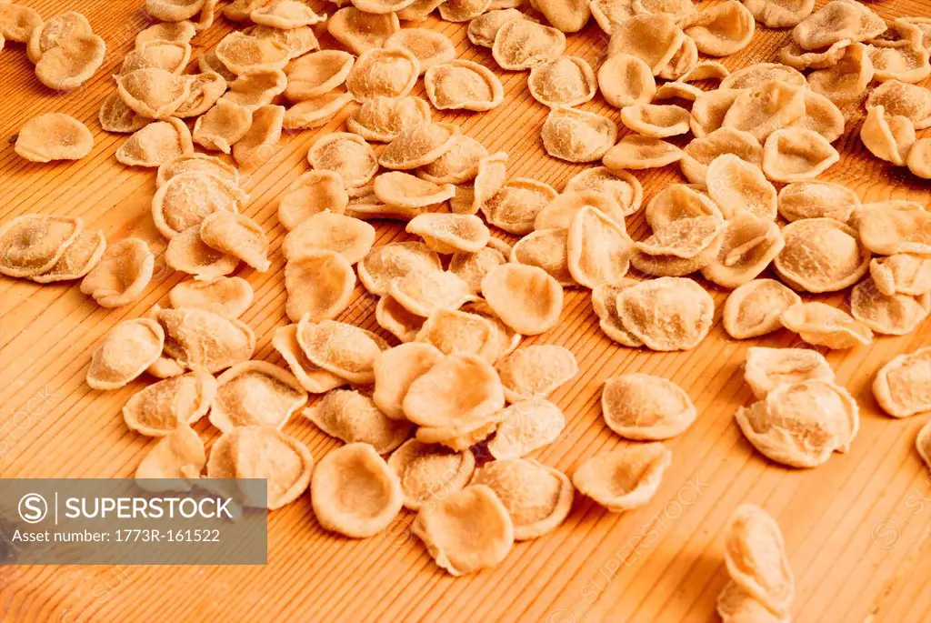 Fresh pasta on wooden board