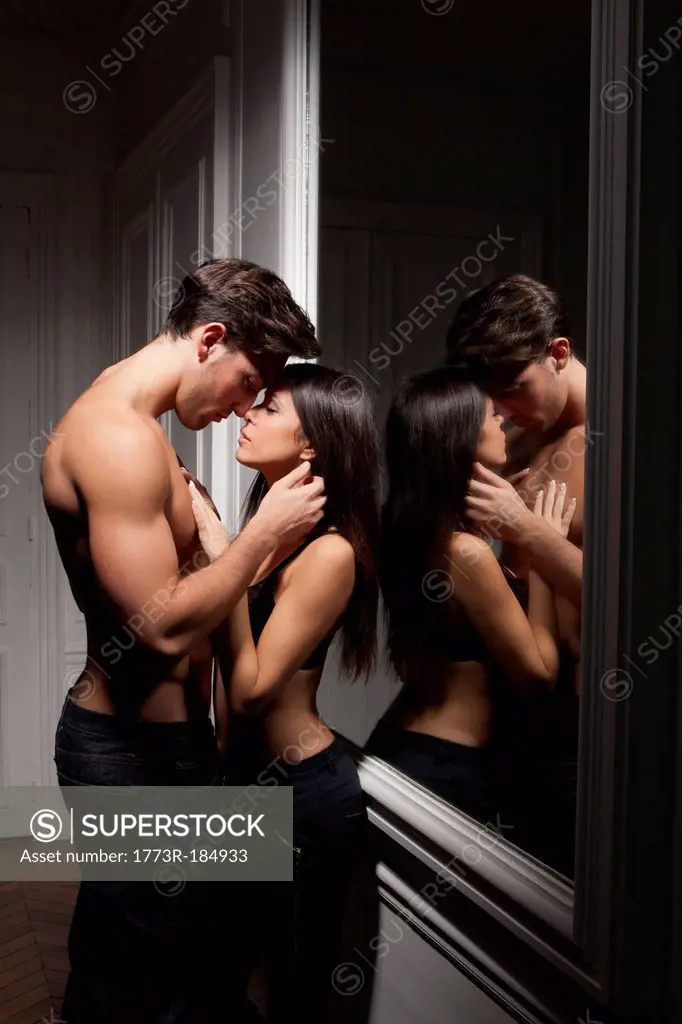 Sexy love couple in underwear hugging and kissing
