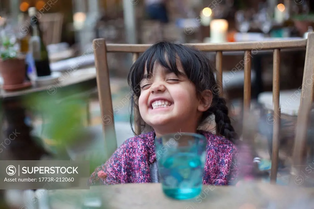 A little girl playing by herself