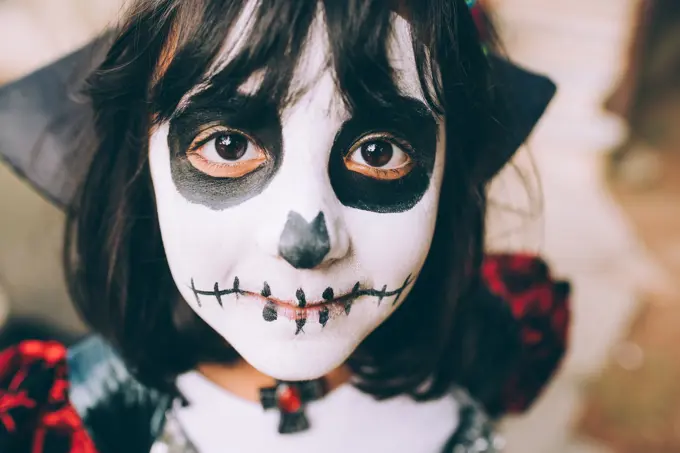 Girl with Halloween face paint