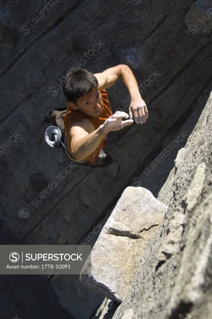 Man bouldering outdoors - in action