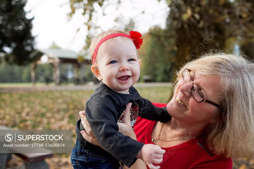 A Grandmother Holding Her Youngest Granddaughter