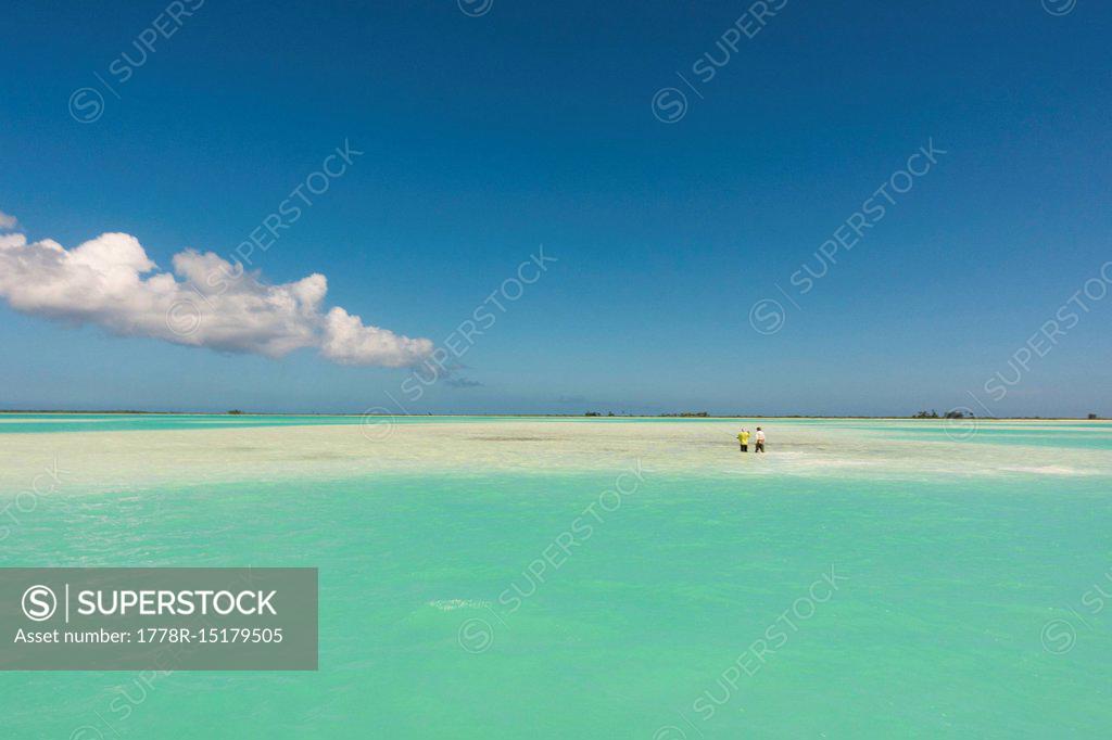 Blue sky over green waters of Christmas Island coral lagoon, Kiribati ...