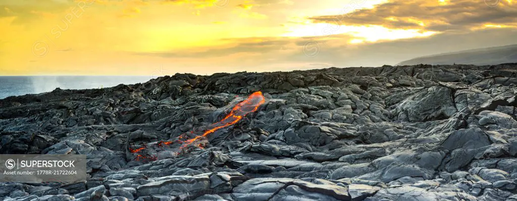 Fresh lava breaking through at the Kalapana lava flows, on the big island of Hawaii.