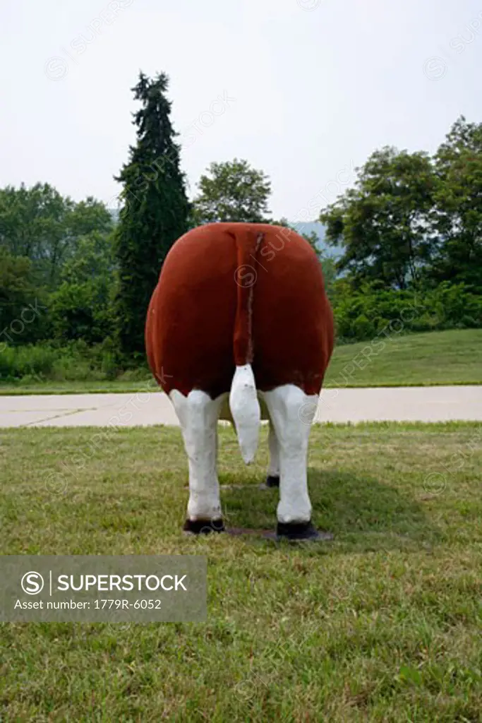 Rear view of cow statue