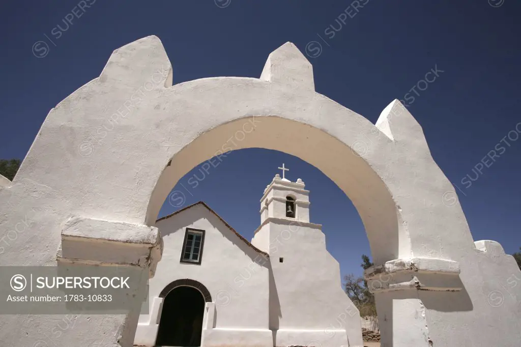 Arch and church in Chile., Church in San Pedro de Atacama, Chile.