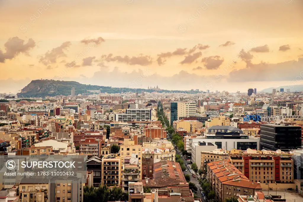 View of Barcelona at sunrise; Barcelona, Catalonia, Spain