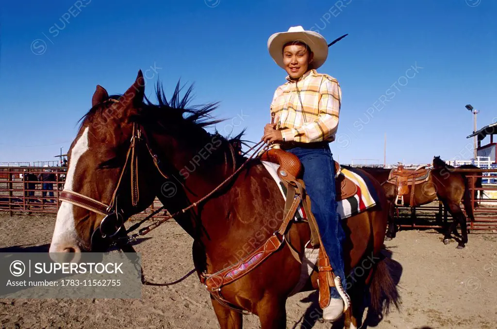 A Female Crow Indian Taking Part During The All Indian Rodeo During The Annual Crow Fair (August), The Largest Native American Festival In The Usa. Th...