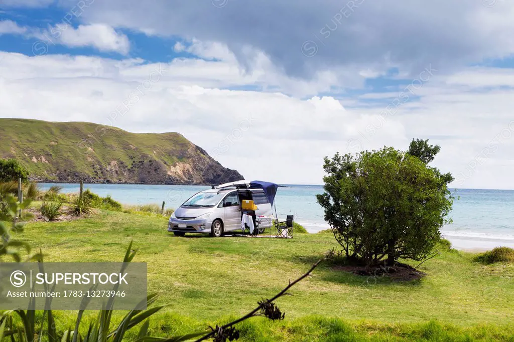 A beachfront campsite on the northernmost tip of the Coromandel Peninsula; Port Jackson, Waikato, New Zealand