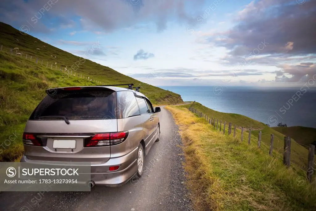 A sunset drive on a northern Coromandel beach of Port Jackson; Waikato, New Zealand