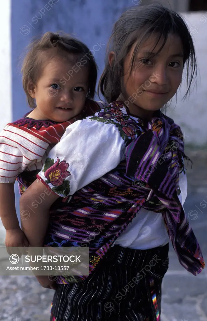 Mayan girl with baby , Chichicastenango, Guatemala.