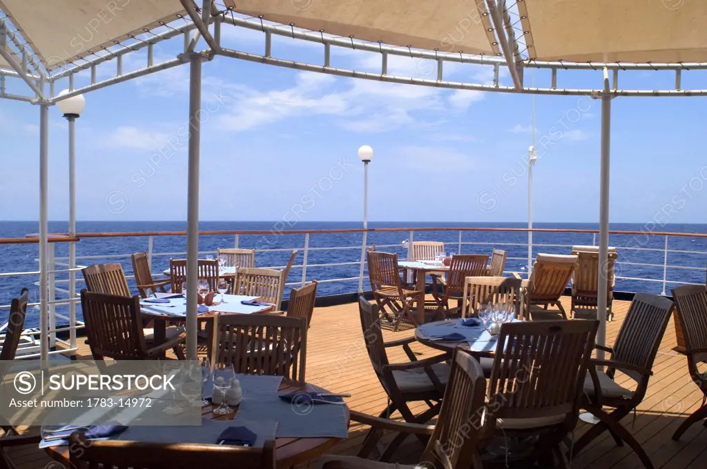 Tables set for lunch aboard cruise ship, MS Island Sky, Indian Ocean.