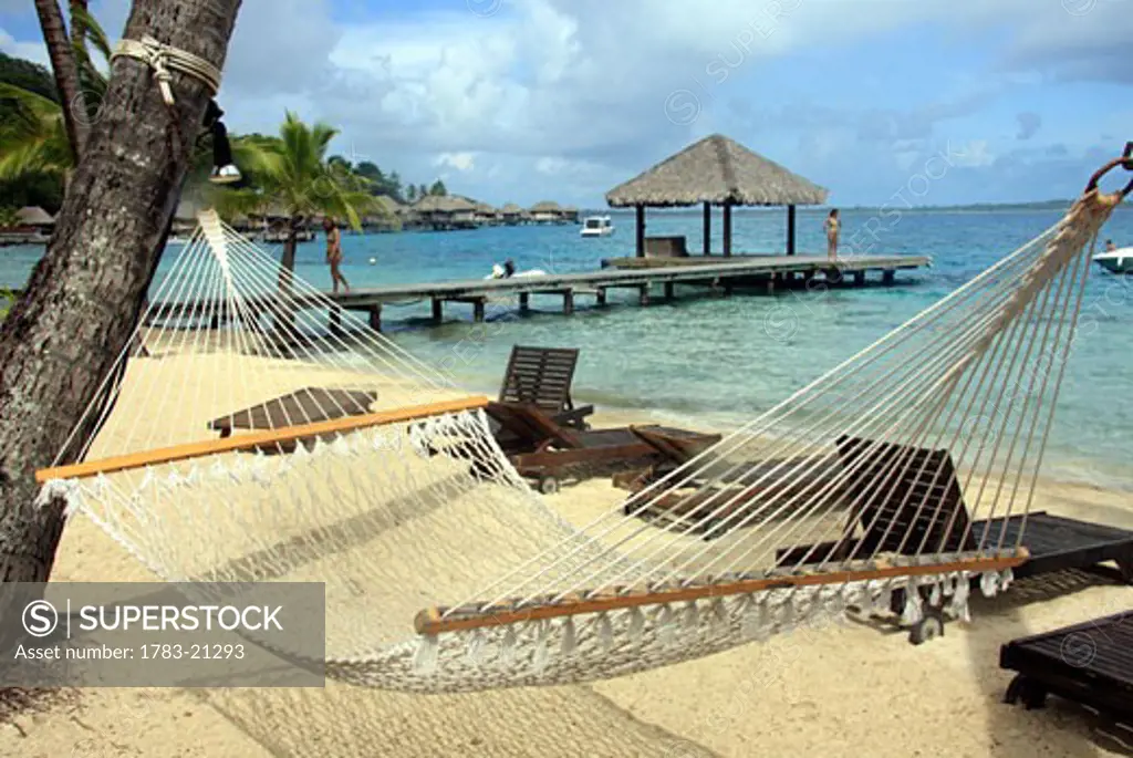 Hammock on beach at Hotel Bora Bora, Bora Bora, French Polynesia.