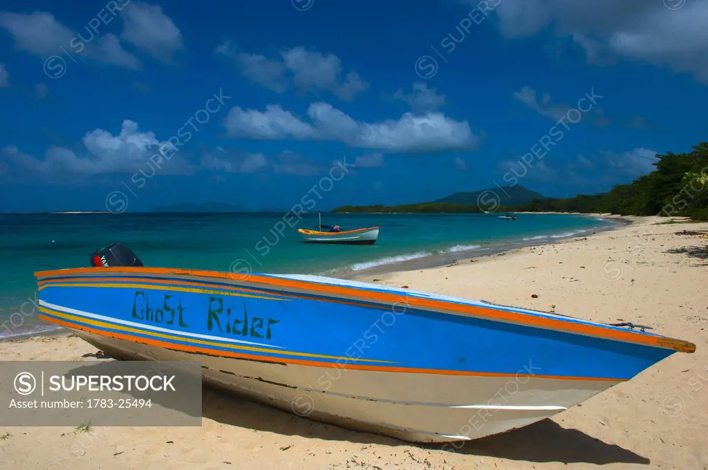 A beached boat on Paradise Beach Carriacou Islands