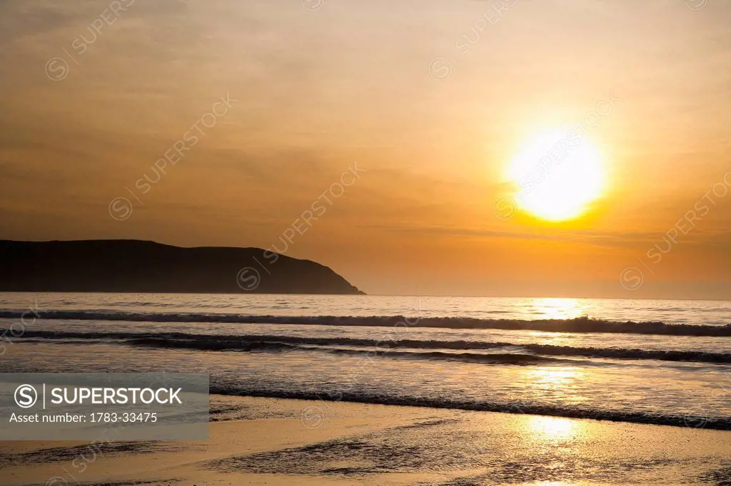 Sunset Over The Sea And Beach In Putsborough Sands, North Devon, Uk