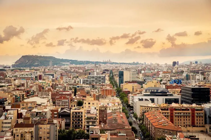 View of Barcelona at sunrise; Barcelona, Catalonia, Spain