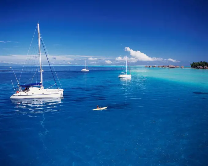 Boats moored off the coast of Tahiti; Tahiti