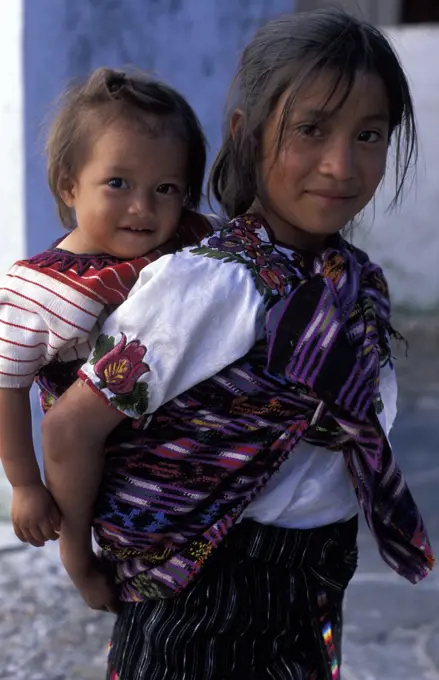 Mayan girl with baby , Chichicastenango, Guatemala.