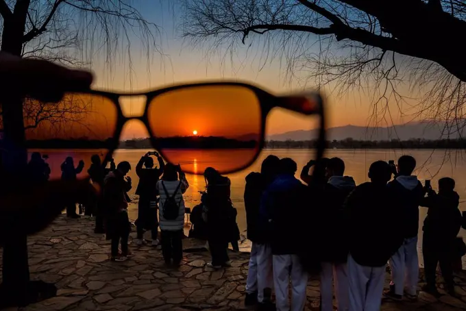 Sunset at the Summer Palace seen through a pair of sunglasses, The Summer Palace; Beijing, China