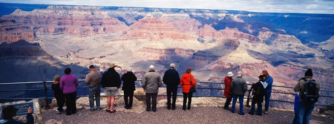 Tourists admiring Grand Canyon, Arizona, USA