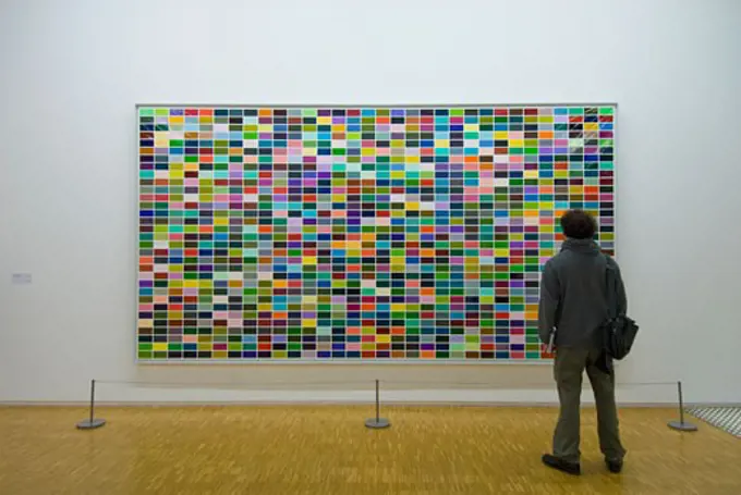 A man looking at a painting in the Pompidou Centre Museum of Modern Art , 1024 Farben (1024 colours) by Gerhard Richter (1973), Paris, France 