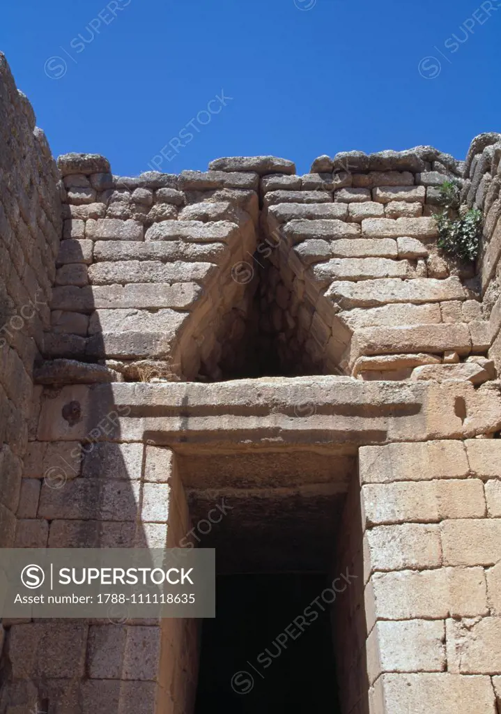 Entrance to Treasury of Atreus, tholos tomb also known as the Tomb of Agamemnon, Mycenae necropolis (UNESCO World Heritage List, 1999), Greece. Mycenaean civilisation, 15th century BC. Detail.