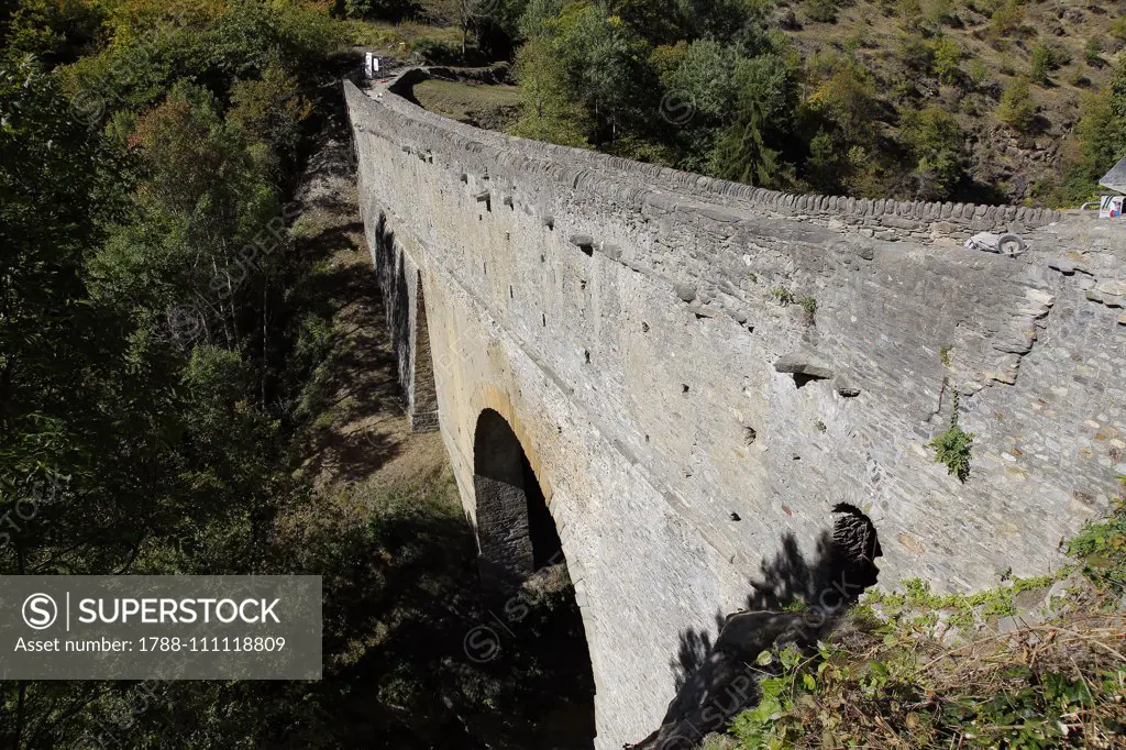 Roman aqueduct bridge of Pont d'Ael over Grand Eyvia creek, Aymavilles, Aosta Valley, Italy, 1st century BC.