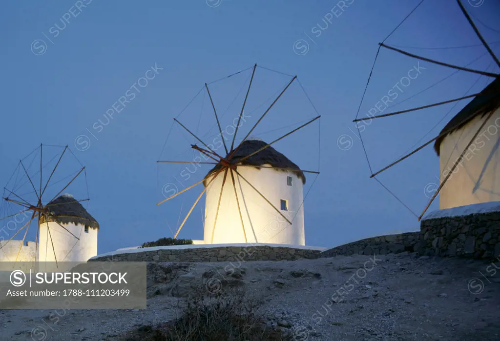 Kato Mili windmills at sunset, Mykonos town, Mykonos, Cyclades islands, Greece, 16th-20th century.