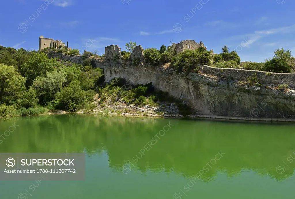 The castle and the basin formed by the dam, Saint-Saturnin-les-Apt, Provence-Alpes-Cote d'Azur, France.