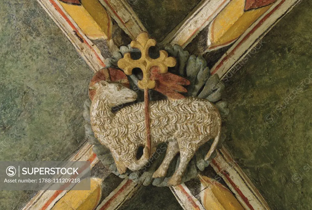 Decoration depicting a lamb holding the banner, symbol of Christ, keystone over the altar of the abbey church of Romainmotier, Canton of Vaud, Switzerland.