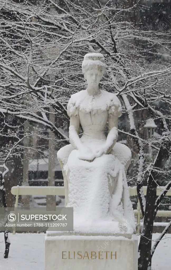 Snow falling on the Monument to Empress Sissi, 1903, by Hermann Klotz (1850-1932), marble, Winter Promenade, Merano, Trentino-Alto Adige, Italy, 20th century.