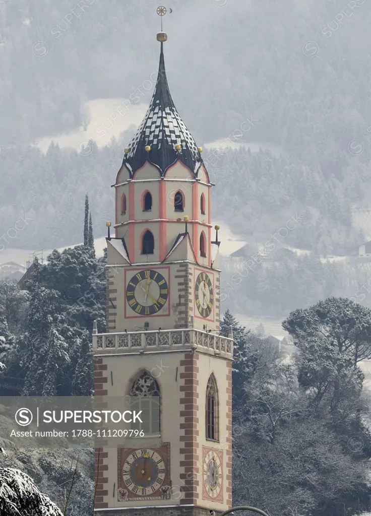 Winter view of the Bell Tower of the Church of San Nicolo, Merano, Trentino-Alto Adige, Italy, 15th-17th century.