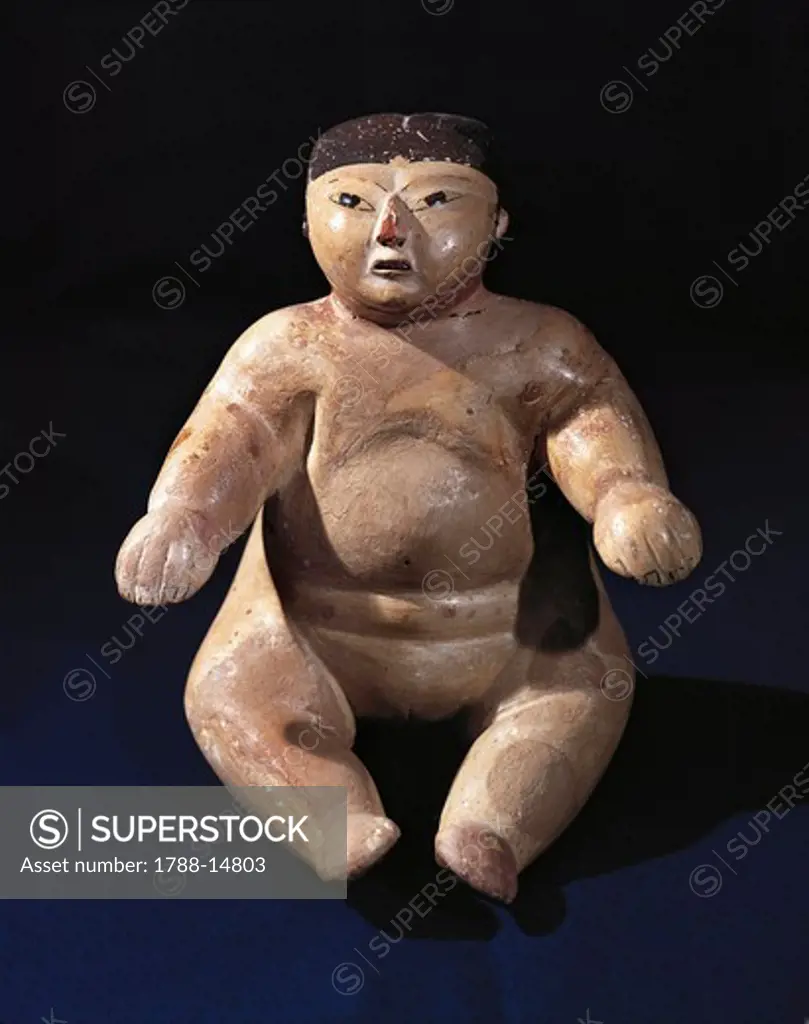 Female figure in polychrome ceramic, from Peru