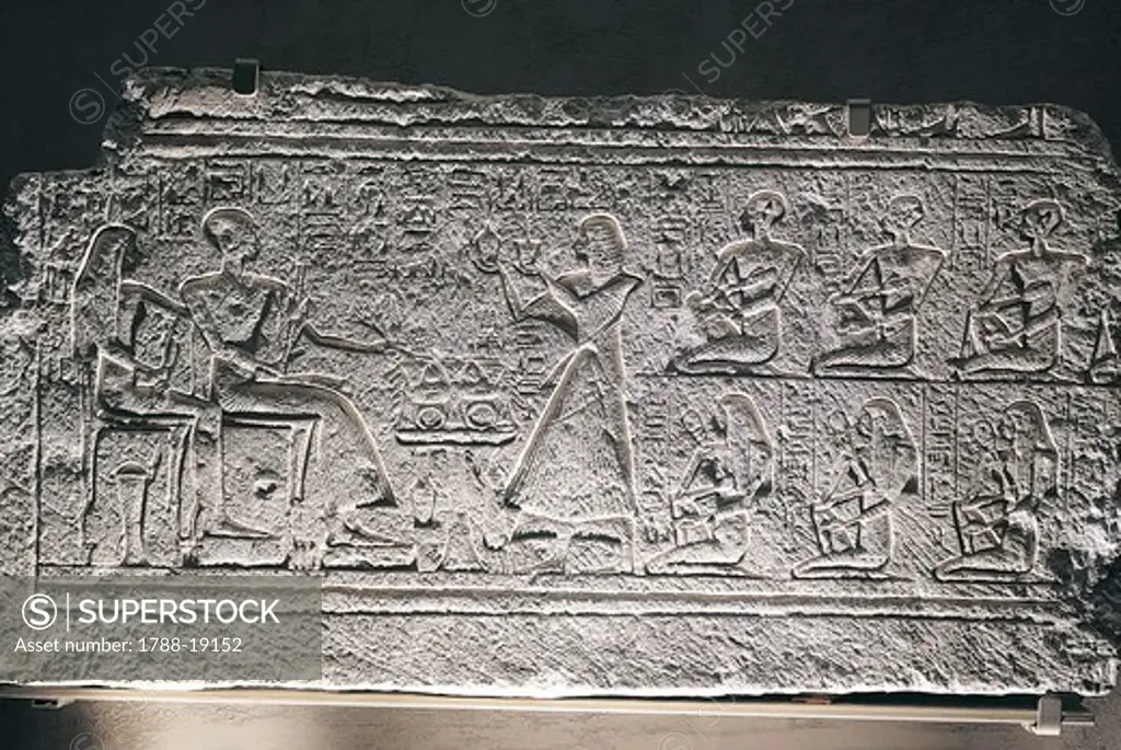 Relief of Ptahotep and Tauseret from Saqqara, the couple receiving offers from their eldest son Amenheb and other children