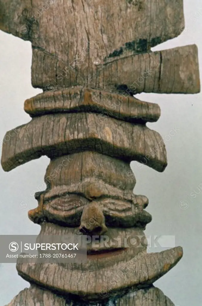 Wood carving depicting the first ancestor, on the roof of the House of Men (centre of Aboriginal social and religious life), Australia.